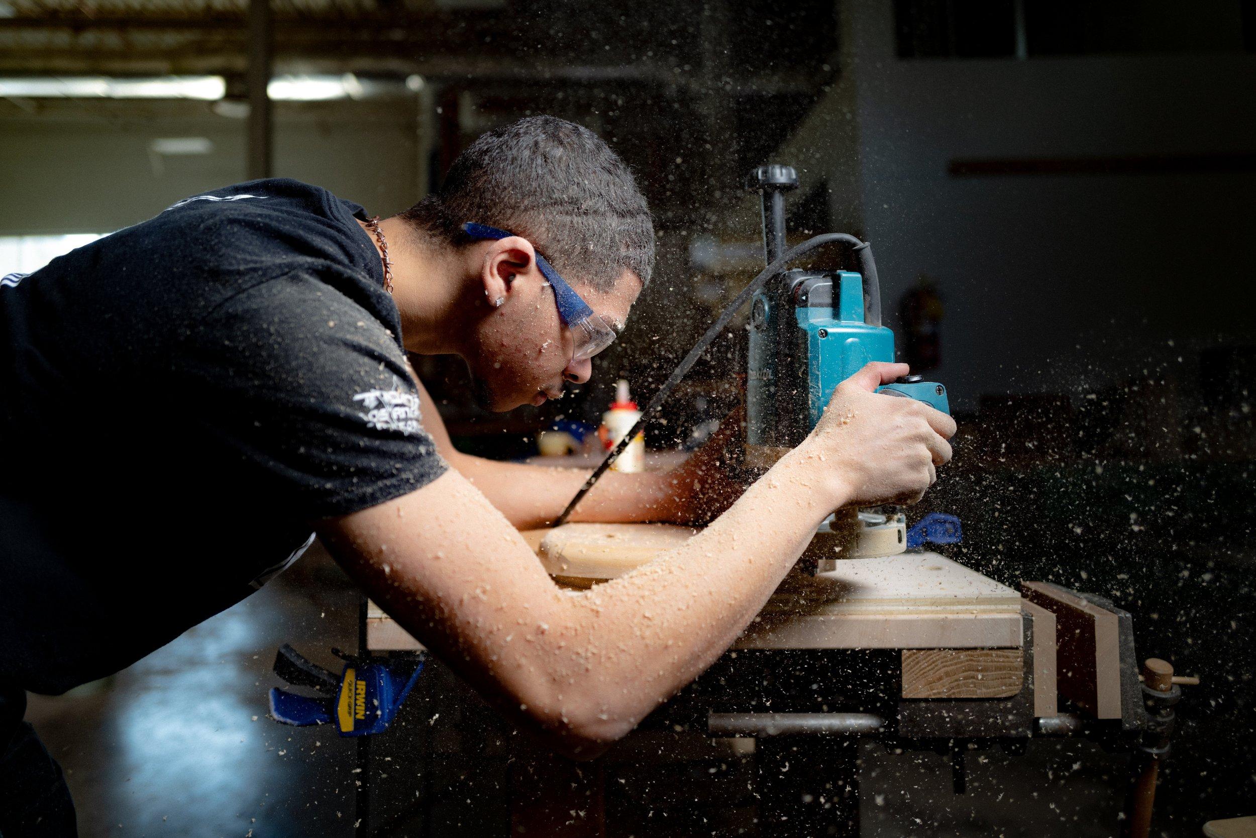 Student working in the campus woodworking shop